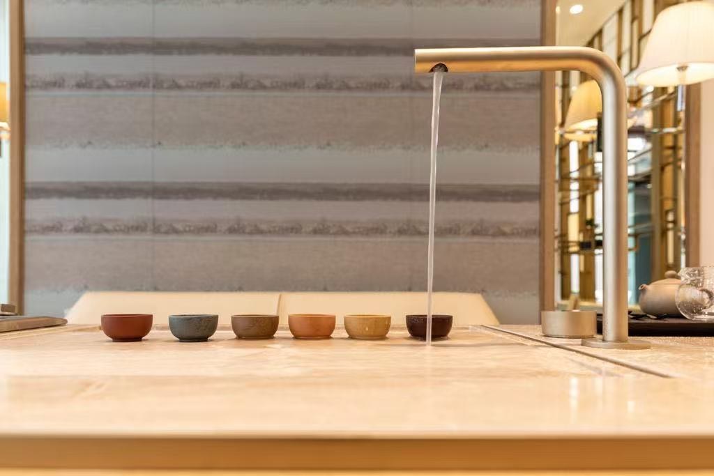 Custom marble tea counter with integrated fittings